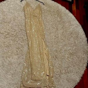 Never worn gold sequined floor length gown